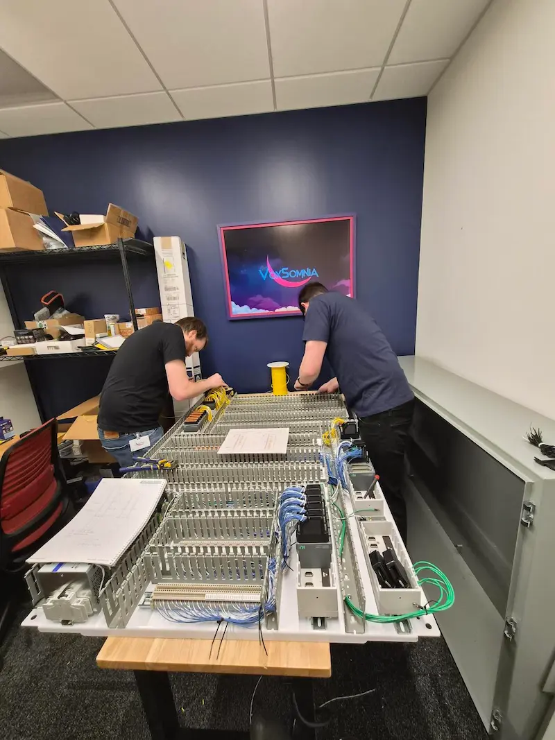 VoxSomnia staff wiring the panel box.