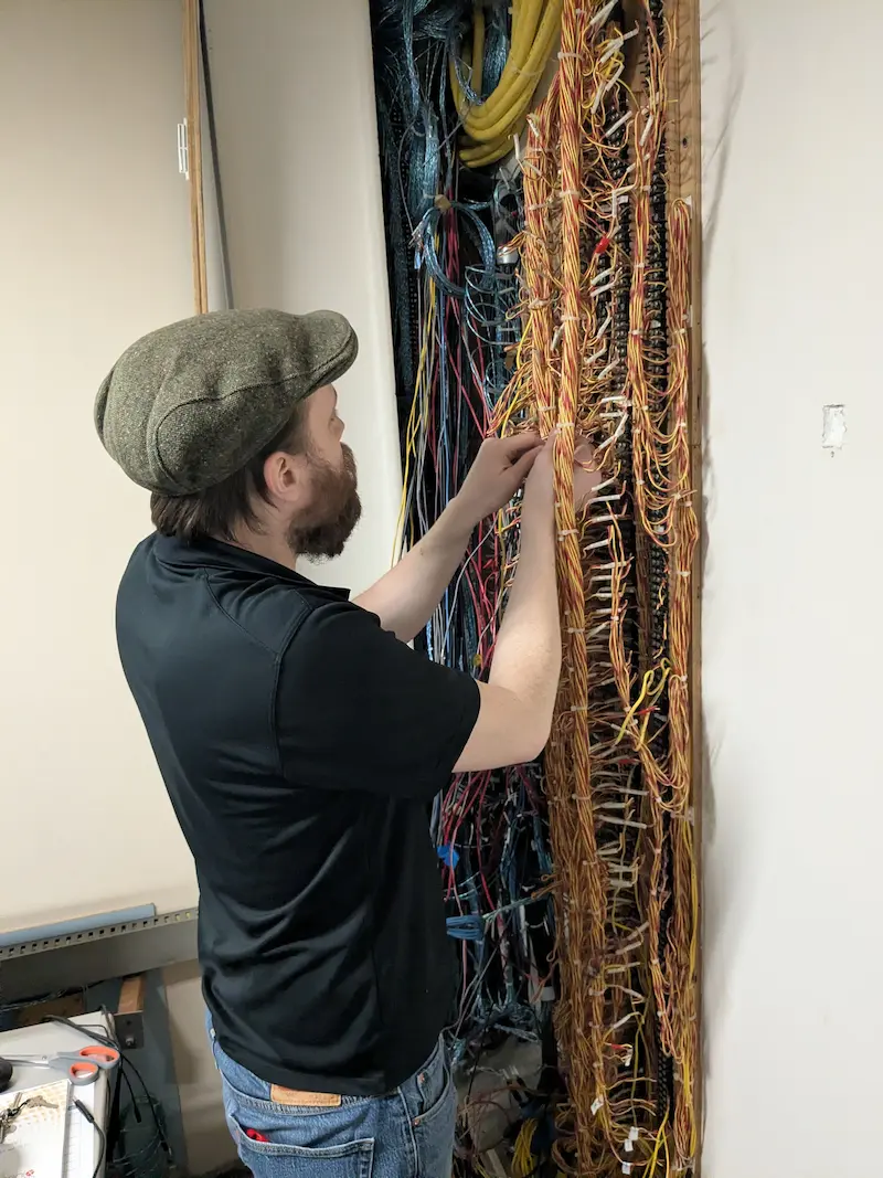 VoxSomnia staff wiring the panel box.