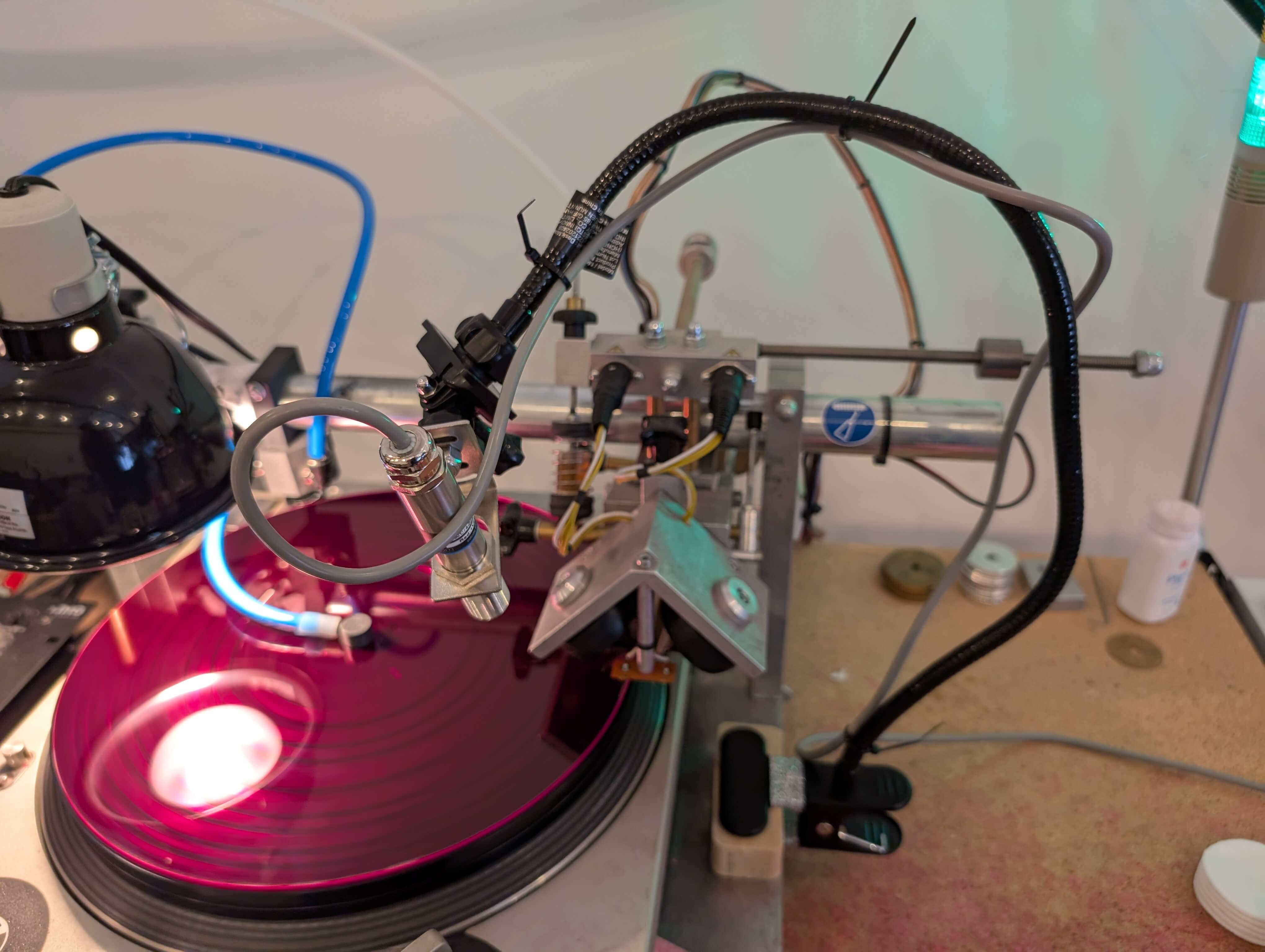 By connecting the temperature sensor to a flexible webcam arm, David and his team can control the positioning of the temperature reading.